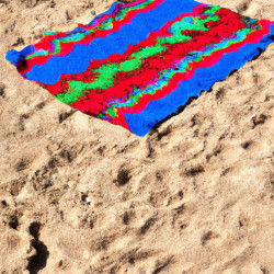 Coupon for: Tommy Bahama Free Beach Towel Offer